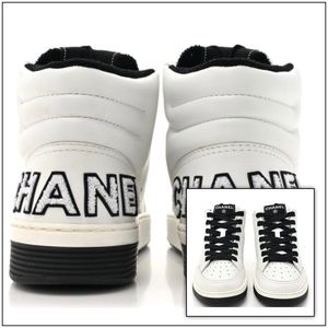 Chanel, 9, Calfskin logo high top.